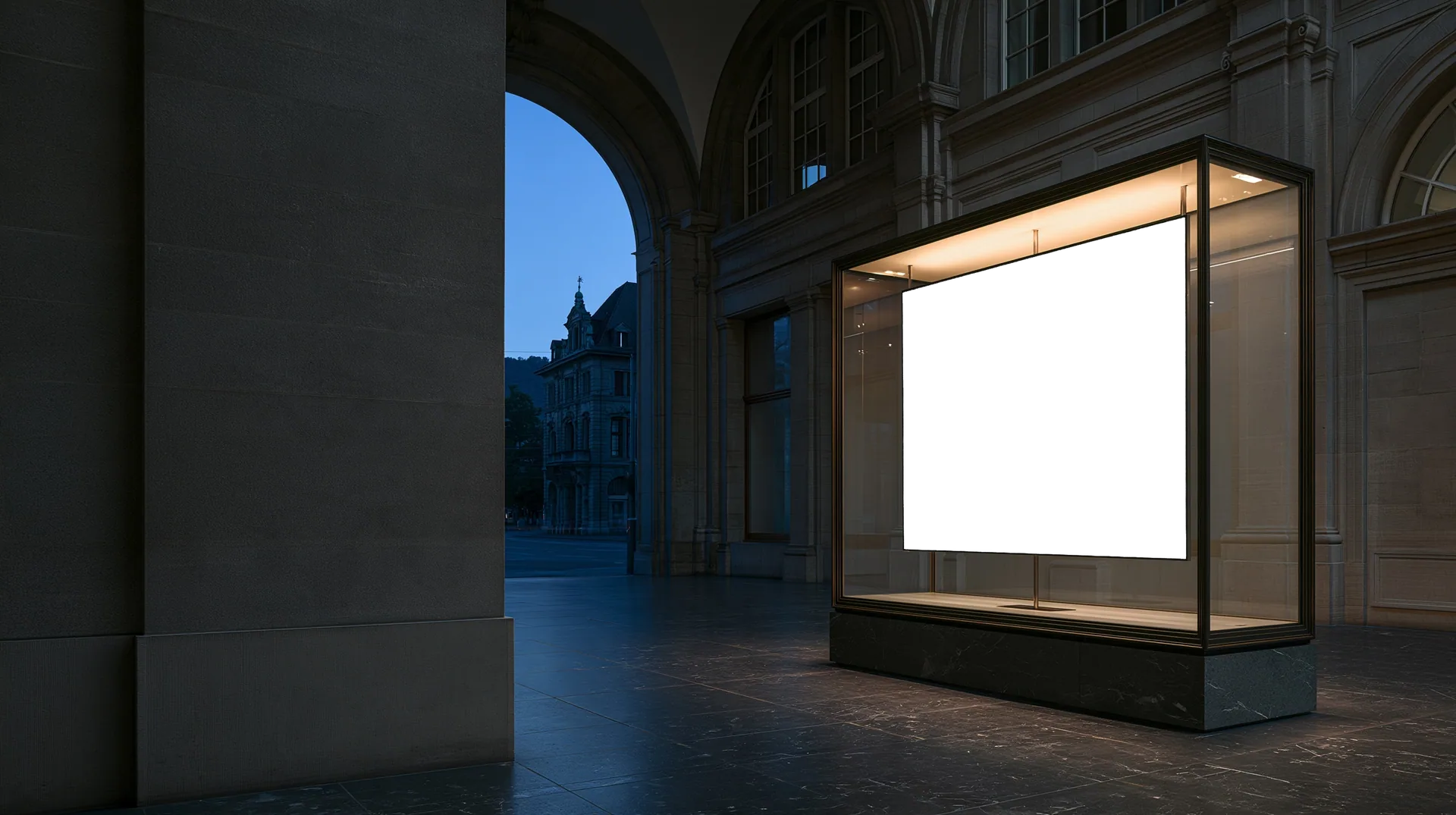 An empty shop window with a bare oak floor and a single spotlight, its screen waiting for the next website