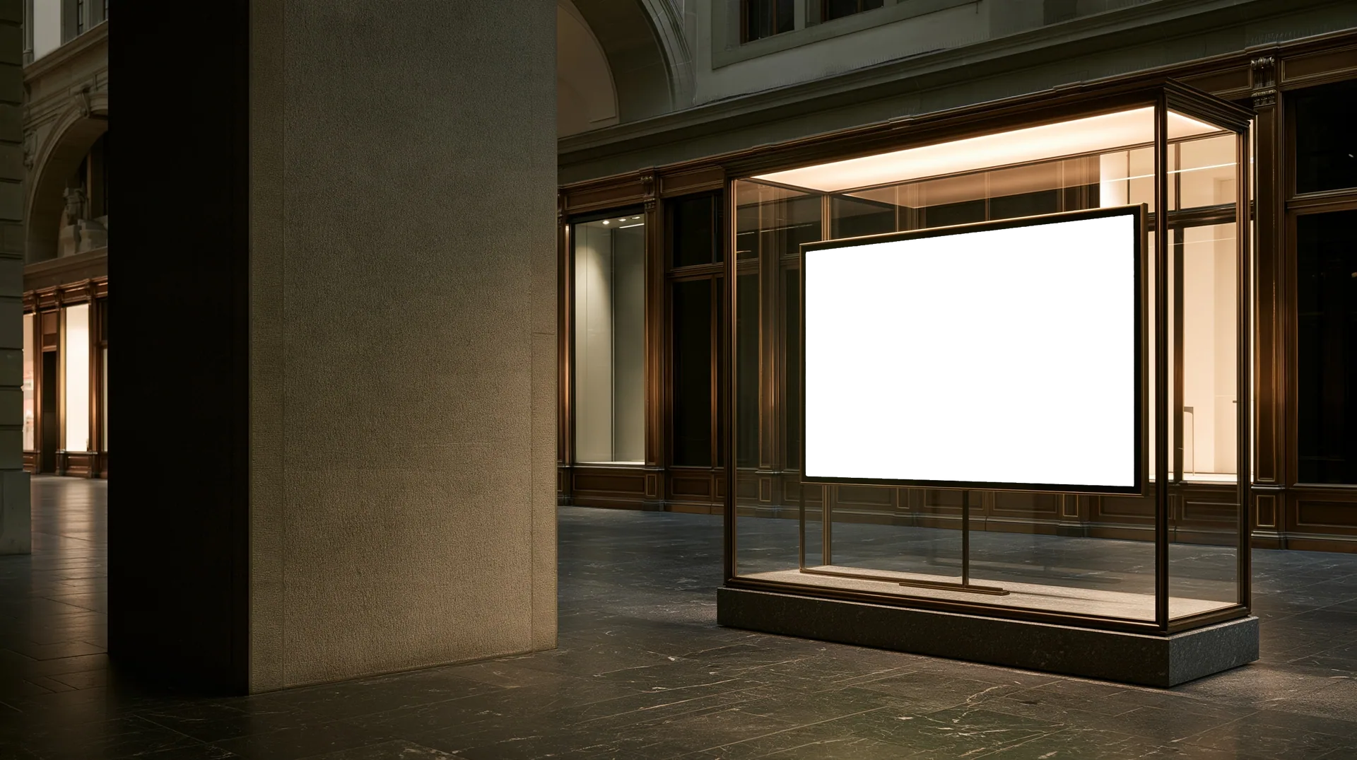A vaulted stone passage at night, lined with lit glass display cases